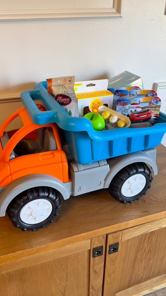 Toy dump truck filled with Easter treats and toys as an alternative basket.
