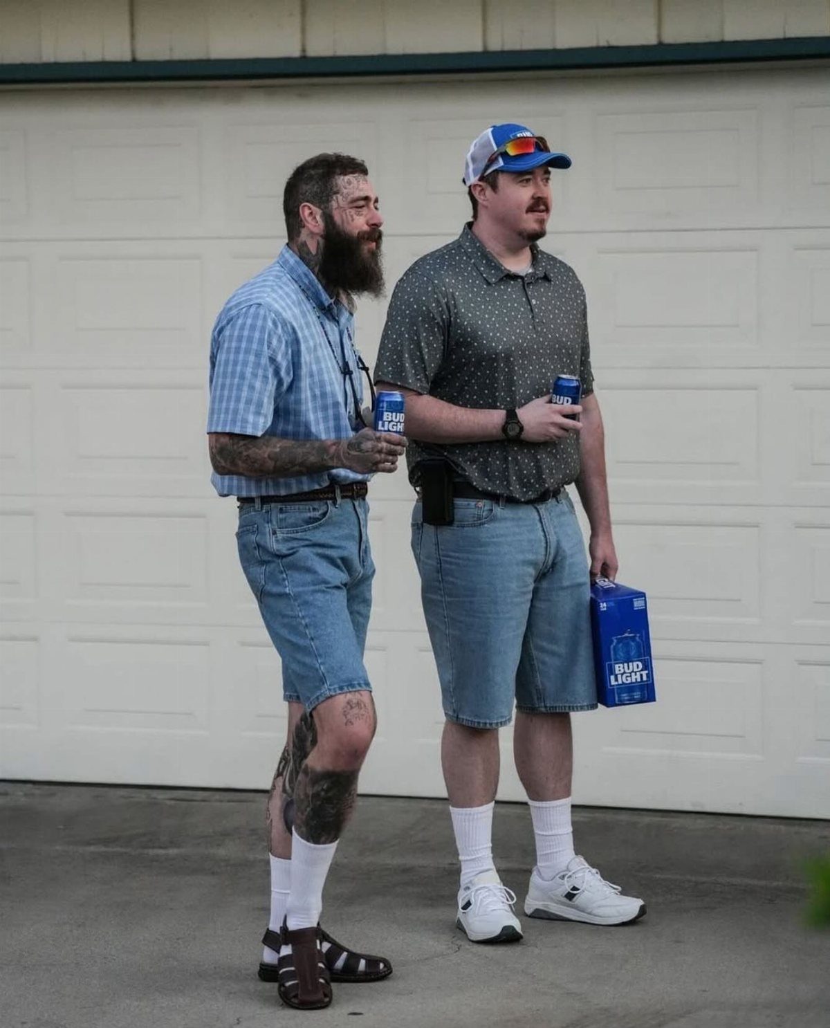 Two men dressed as dads wearing button-down shirts and denim shorts outdoors.