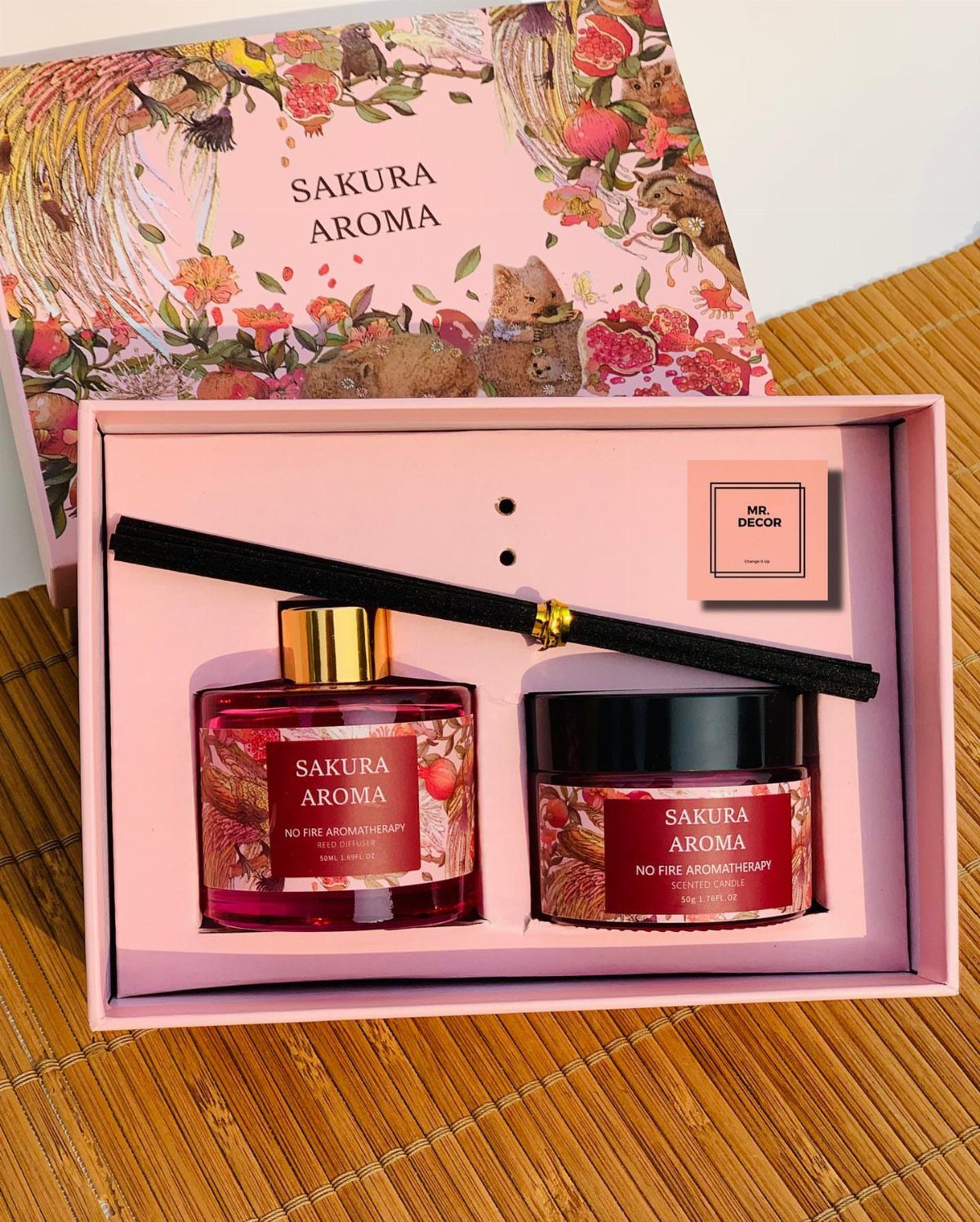 Sakura Aroma gift set with red fragrance oil and reed diffuser in pink box