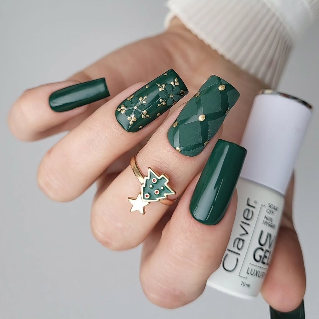Forest green short nails with gold floral and quilted patterns and a Christmas ring