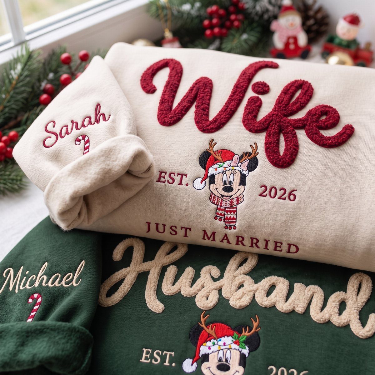Two embroidered Christmas sweaters for a husband and wife with Disney characters.