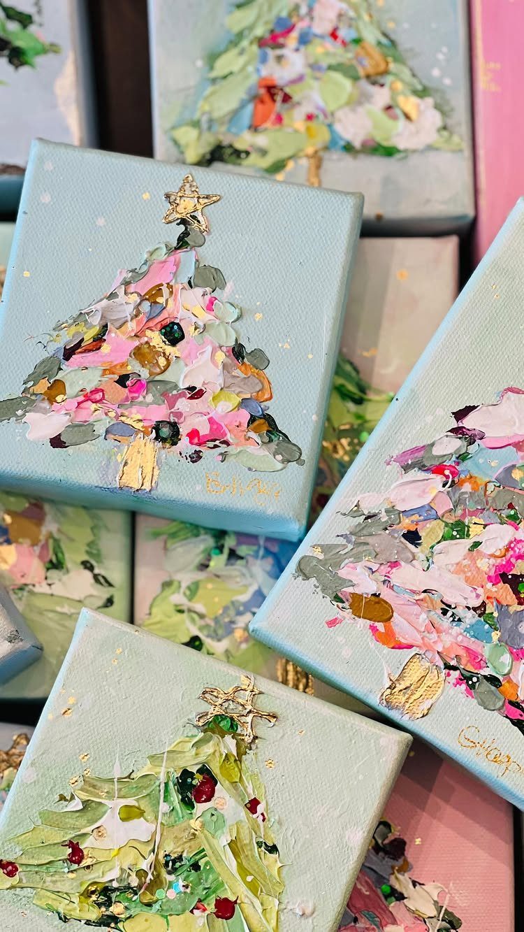 Small square canvases with textured impasto paintings of colorful Christmas trees