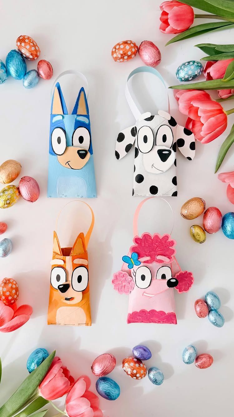 Bluey character themed paper gift bags surrounded by colorful Easter eggs and tulips.