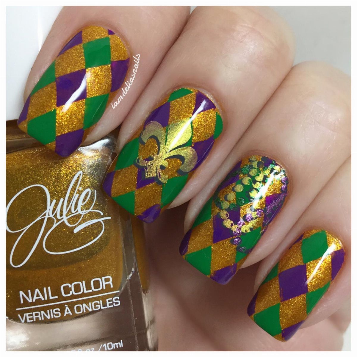 Mardi Gras themed nails with purple, green, and gold harlequin patterns and fleur-de-lis.