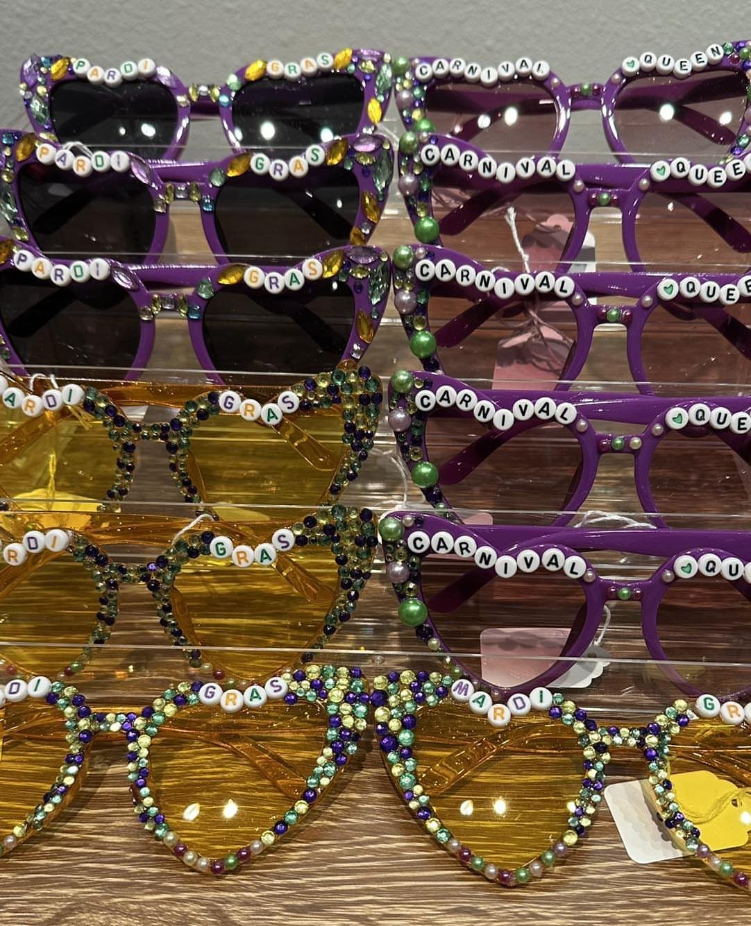 Beaded purple and gold sunglasses with Mardi Gras and Carnival letter beads.