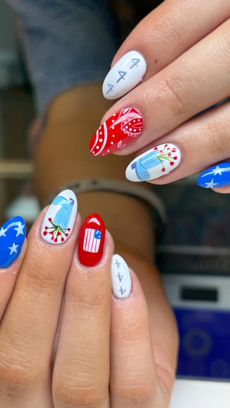 Patriotic red, white, and blue nail art with stars and stripes designs.