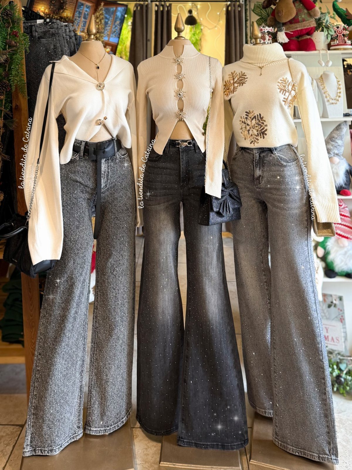 Three mannequins wearing sparkly wide-leg sequin pants and white knit tops in a store.
