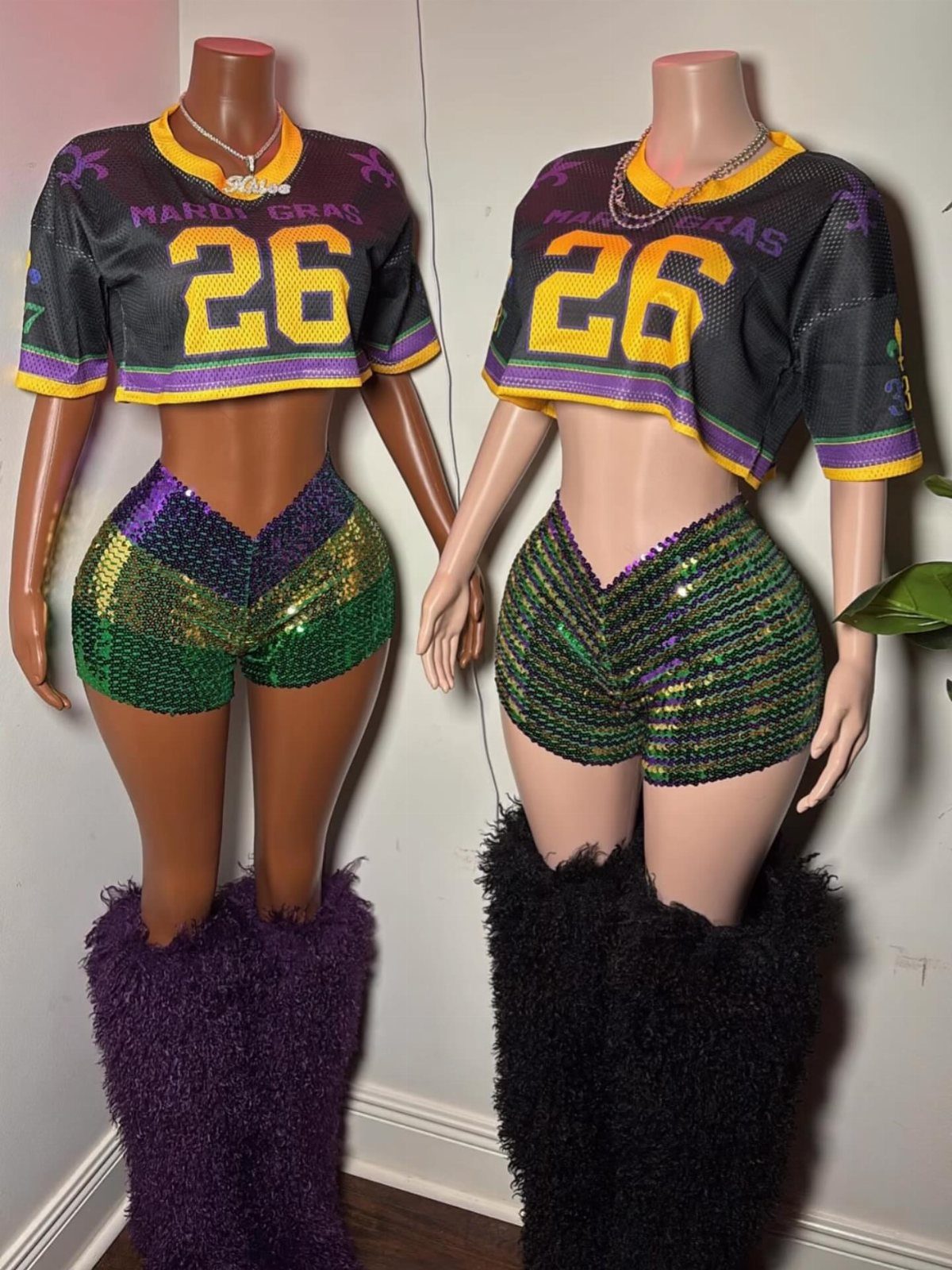 Mardi Gras party outfits on mannequins featuring cropped jerseys and sequined shorts.