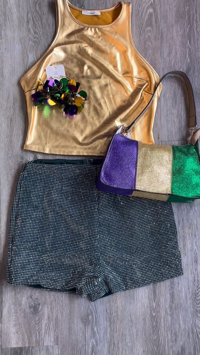 Gold metallic top, green sparkly shorts, and a purple, gold, and green glittery bag.